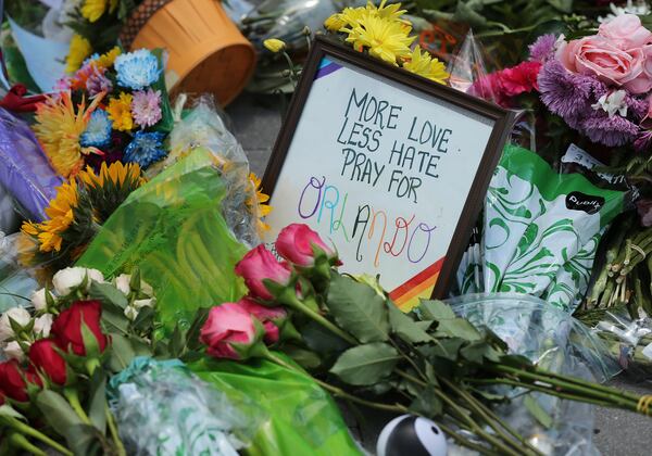 061516 ORLANDO: A sign sits in a growing memorial on Orange Avenue a block from the Pulse nightclub in Orlando on Wednesday, June 15, 2016. Curtis Compton/ ccompton@ajc.com