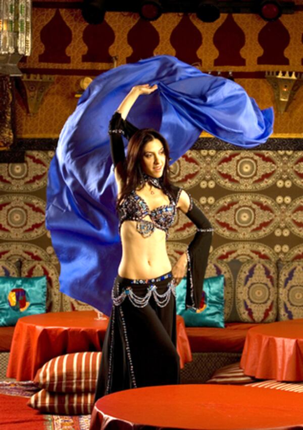 Dilara demonstrates some of her belly dancing technique at Imperial Fez, where guests are encouraged to join in.