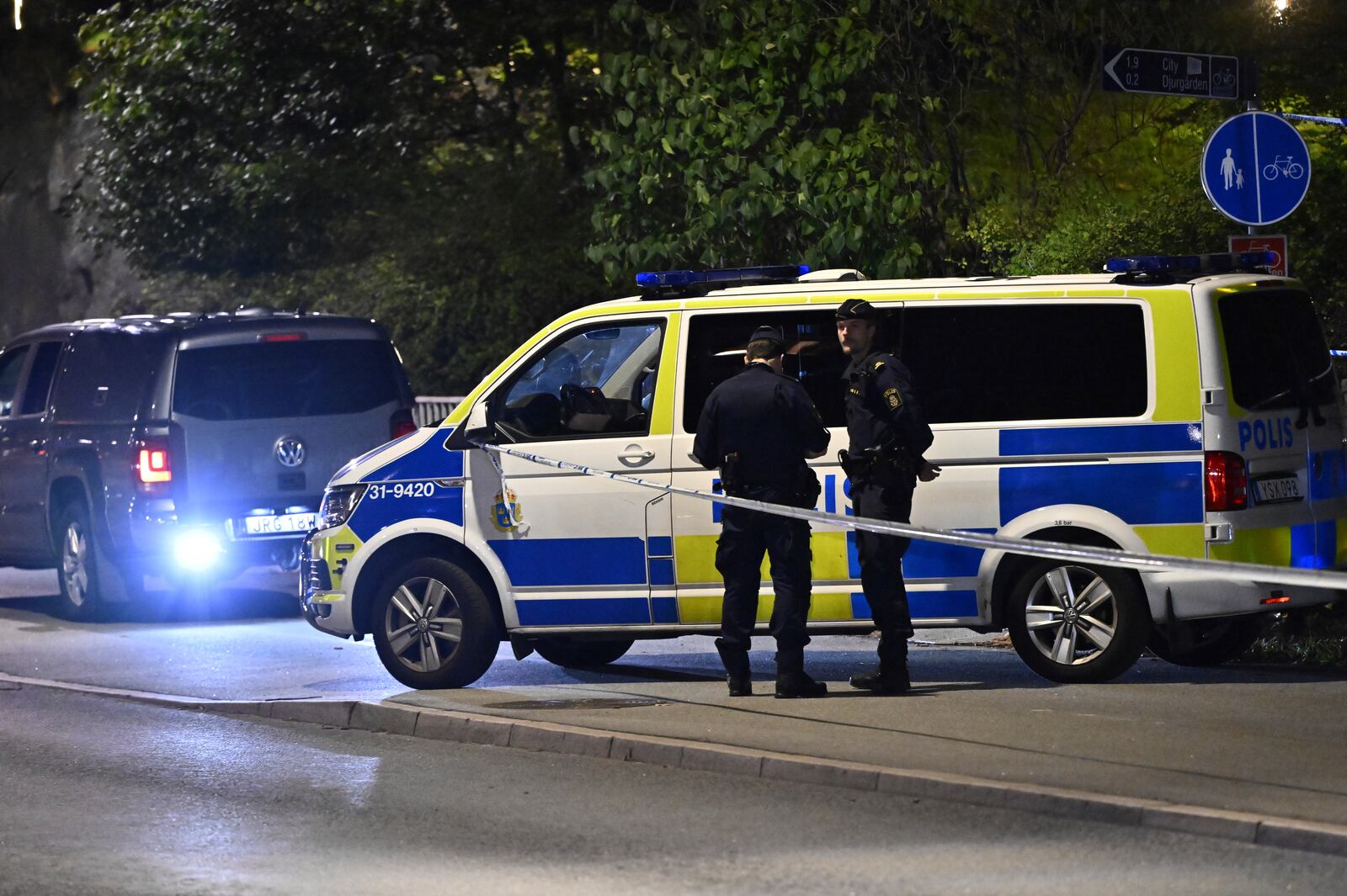 Police guard outside the Israeli embassy in Stockholm, Sweden, Tuesday, Oct. 1, 2024, after a suspected shooting near the embassy. (Anders Wiklund/TT News Agency via AP)