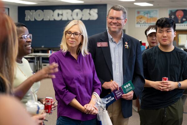 State Rep. Matt Reeves, R-Duluth, with his wife, Suzette beside him, says he doesn't discuss Donald Trump while campaigning in his district. “Every once in a while, I’ll get a question about the presidential race, and I’ll do a lot of listening, but there’s very little common ground there and I don’t spend a lot of time on that,” he said. (Ben Gray / Ben@BenGray.com)