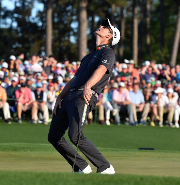 Justin Rose does the big-missed-putt-limbo at the 2017 Masters, where he lost to Sergio Garcia in a one-hole playoff. (BRANT SANDERLIN / SPECIAL)