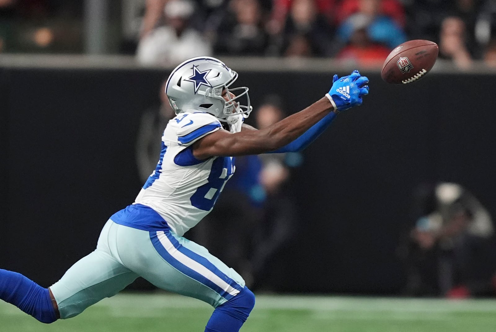 Dallas Cowboys wide receiver CeeDee Lamb tries in vain to catch a pass during the second half of an NFL football game against the Dallas Cowboys, Sunday, Nov. 3, 2024, in Atlanta. (AP Photo/ Brynn Anderson)