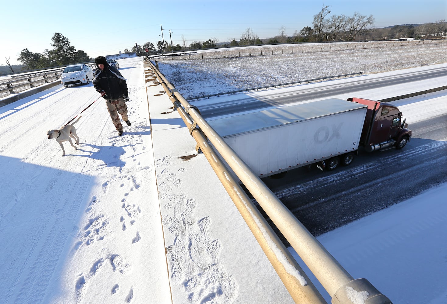 Photos: Frigid cold and snow move in to metro Atlanta