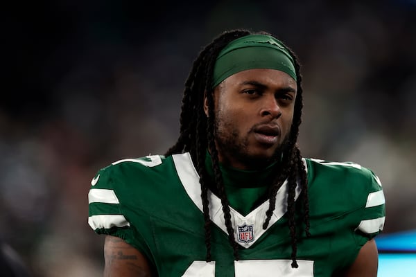 FILE- New York Jets wide receiver Davante Adams (17) reacts during an NFL football game against the Miami Dolphins Sunday, Jan. 5, 2025, in East Rutherford, N.J. (AP Photo/Adam Hunger, file)