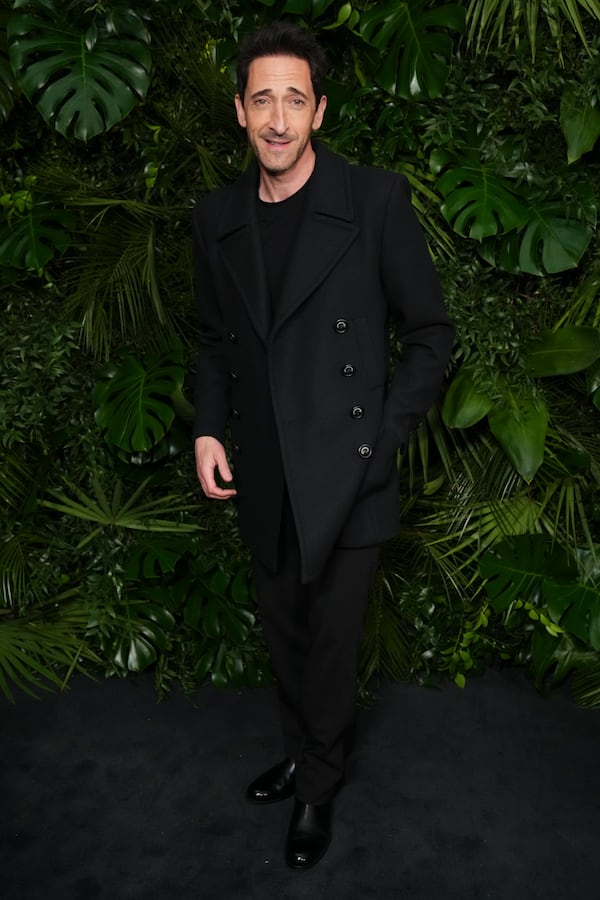 Adrien Brody arrives at Chanel's 16th Annual Pre-Oscar Awards Dinner on Saturday, March 1, 2025, at The Beverly Hills Hotel in Beverly Hills, Calif. (Photo by Jordan Strauss/Invision/AP)