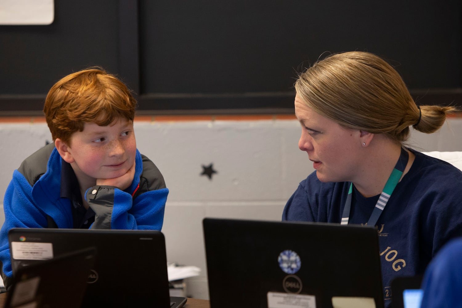 Trisha Tanner, fifth-grade teacher, helps students Nolan Waters with a quiz during class on Wednesday, November 16, 2022, at Hickory Hills Elementary School in Marietta, Georgia. Marietta City Schools, like schools across the country, are working to overcome learning loss caused by the pandemic. CHRISTINA MATACOTTA FOR THE ATLANTA JOURNAL-CONSTITUTION