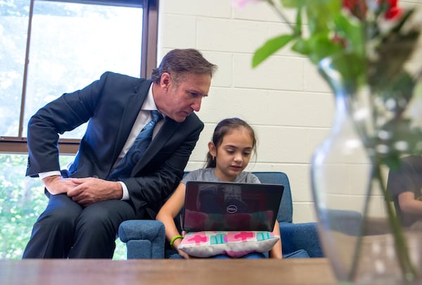 Fulton County Schools Superintendent Mike Looney speaks with Karolina, 9, as he tours Evoline C. West Elementary School on Thursday, June 13, 2019. Looney’s first official day on the job is Monday, June 17. CASEY SYKES FOR THE ATLANTA JOURNAL-CONSTITUTION