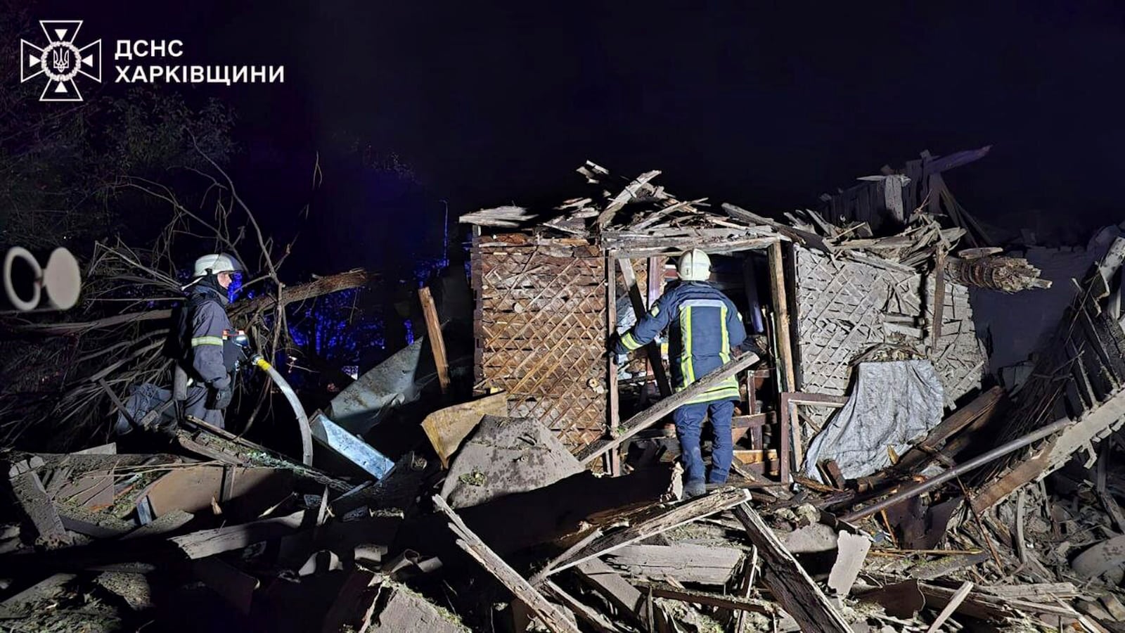 In this photo provided by the Ukrainian Emergency Service on Oct. 21, 2024, rescue workers clear the rubble of a house destroyed by a Russian strike in Kharkiv, Ukraine. (Ukrainian Emergency Service via AP)