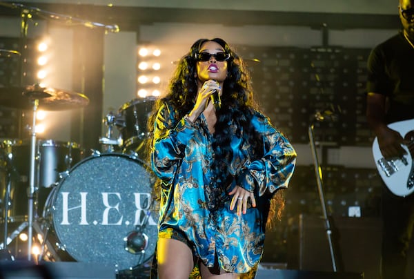 Opening act H.E.R. performs at the Coldplay tour stop at Mercedes-Benz Stadium in Atlanta on Saturday night, June 11, 2022. (Ryan Fleisher for The Atlanta Journal-Constitution)