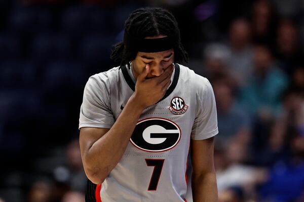 Georgia guard Tyrin Lawrence (7) walks back to the bench during the second half of an NCAA college basketball game against Oklahoma at the Southeastern Conference tournament, Wednesday, March 12, 2025, in Nashville, Tenn. (AP Photo/Wade Payne)