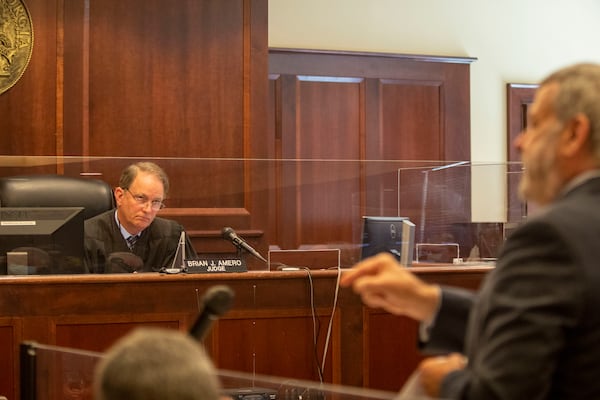 Superior Court Judge Brian Amero listens as attorney Don Samuel, right, speaks on behalf of the Fulton County Elections Board during a hearing at the Henry County Courthouse in McDonough on a motion to dismiss a review of Fulton County elections ballots. The hearing took place on June 21, 2021.(Alyssa Pointer / Alyssa.Pointer@ajc.com)

