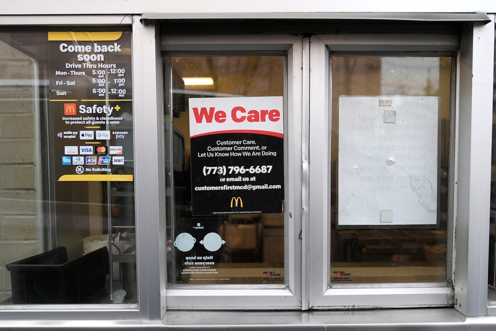 A McDonald's pick-up window in Chicago, Wednesday, Oct. 23, 2024. (AP Photo/Charles Rex Arbogast)