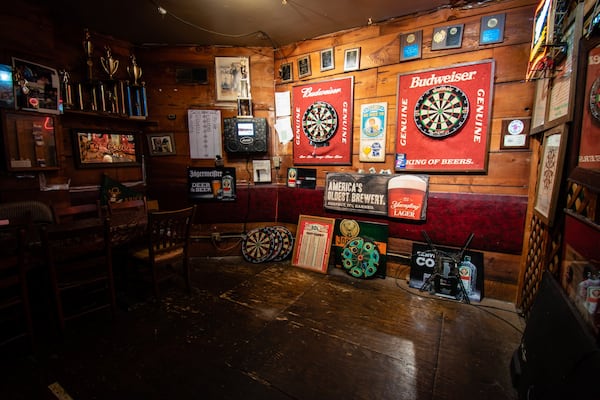 The darts room at the Rusty Nail is one of the few areas of the bar with bright lighting. CONTRIBUTED BY HENRI HOLLIS