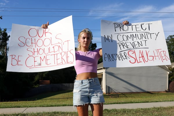 Gretchen Gierlach, 18, of Gwinnett County, shows her thoughts about Wednesday's shooting at Apalachee High School in Winder that killed four. (Jason Getz / AJC)
