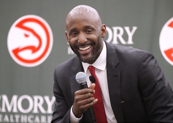 Lloyd Pierce is all smiles as the Atlanta Hawks introduce him as the 13th full-time coach of the NBA franchise Monday, May 14, 2018, in Atlanta. (Curtis Compton/ccompton@ajc.com)