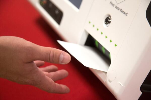 The voting system used for testing earlier this month during Conyers’ municipal elections started with voters using a touch screen that then produced a paper ballot. STEVE SCHAEFER / SPECIAL TO THE AJC