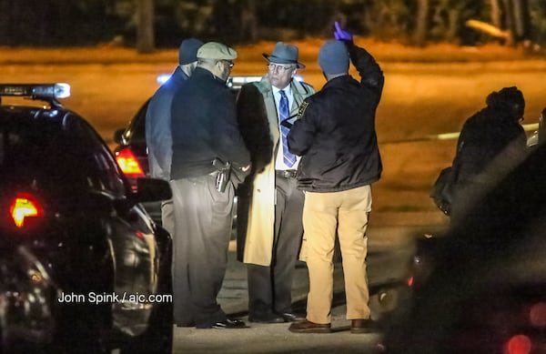 DeKalb County police are investigating a deadly home invasion. A man home with his two children wrestled with a masked intruder and shot him to death, police said. JOHN SPINK / JSPINK@AJC.COM