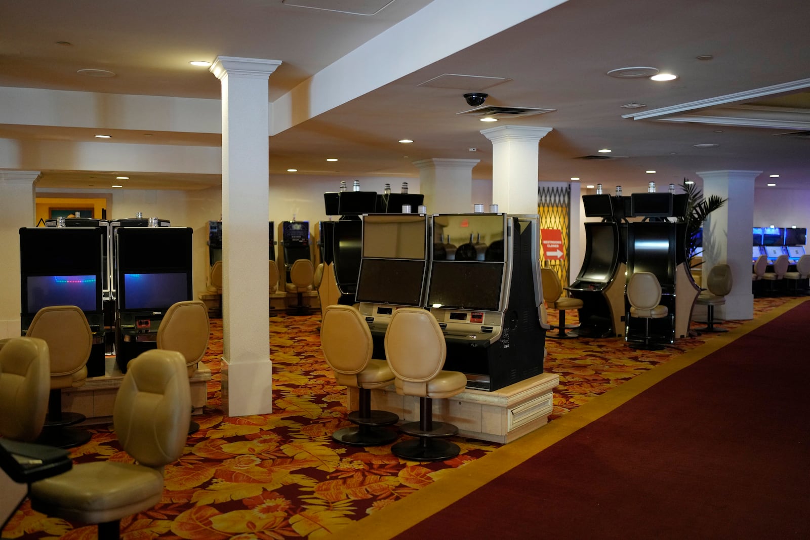 FILE - Shut down slot machines adorn the casino floor in preparation for closing the Tropicana hotel-casino Friday, March 29, 2024, in Las Vegas. (AP Photo/John Locher, File)