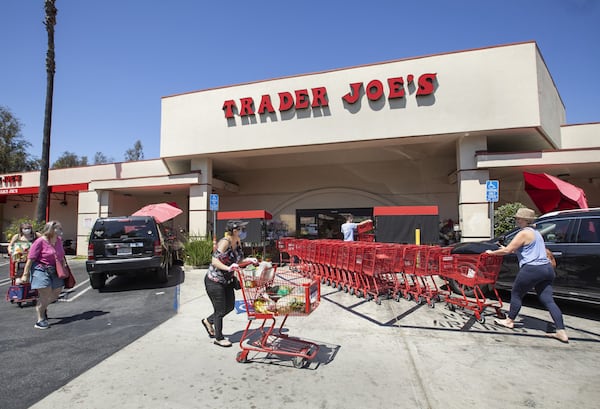 Trader Joe's raised wages, but Kroger, the parent company of Fred Meyer and QFC, announced that it would close two grocery stores in Long Beach, California, in response to a 120-day $4-an-hour pay raise mandated by the City Council there. (Mel Melcon/Los Angeles Times/TNS)