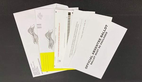 Absentee ballot packets mailed to voters include a return envelope, a ballot, instructions and a privacy sleeve. The privacy sleeve replaced the inner envelope that in previous elections enclosed absentee ballots.