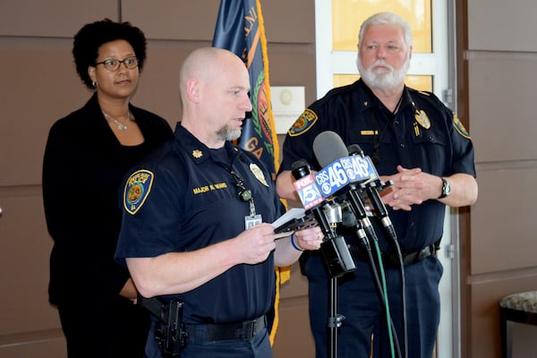 College Park police Maj. Nathan Ward addresses the media Wednesday at the department's headquarters. At right is police Chief Ferman Williford.