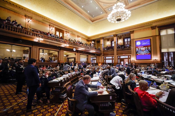 Lawmakers gather at the Capitol in Atlanta on Thursday, which was Crossover Day.