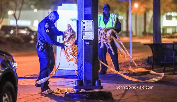 The shooting took place in front of an upscale hotel  in Buckhead. JOHN SPINK / JSPINK@AJC.COM