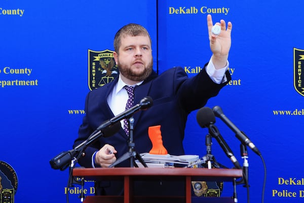 Detective J. Francisco of the DeKalb County Police Department shows the Project Lifesaver monitor at a press conference discussing the DeKalb County Police Department’s Project Lifesaver initiative on Friday, October 30, 2020, at the DeKalb County Police Department Headquarters in Tucker, Georgia. The department detailed and demonstrated the Project Lifesaver device, a new wrist and ankle monitor for people with cognitive disabilities. The department has already outfitted 17 individuals with the device, and have another 30 available for use. CHRISTINA MATACOTTA FOR THE ATLANTA JOURNAL-CONSTITUTION.
