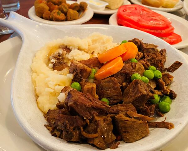 The pot roast is at the Colonnade is longtime favorite.
(Bob Townsend for the Atlanta Journal-Constitution)