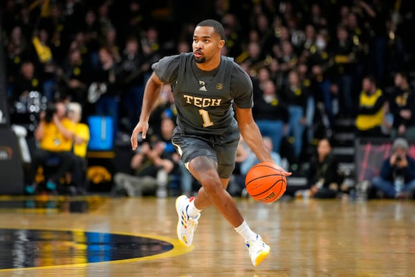 Georgia Tech guard Kyle Sturdivant drives up court during the first half of an NCAA college basketball game against Iowa, Tuesday, Nov. 29, 2022, in Iowa City, Iowa. (AP Photo/Charlie Neibergall)