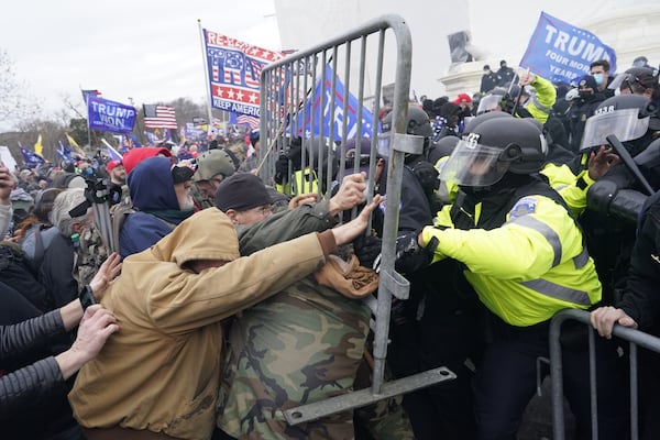 Protesters gather on the second day of pro-Trump events fueled by President Donald Trump's continued claims of election fraud in an attempt to overturn the results before Congress finalizes them on Jan. 6, 2021 in Washington, DC. Whether to call the event a riot or an insurrection depends on whom you ask.  (Kent Nishimura/Los Angeles Times/TNS)