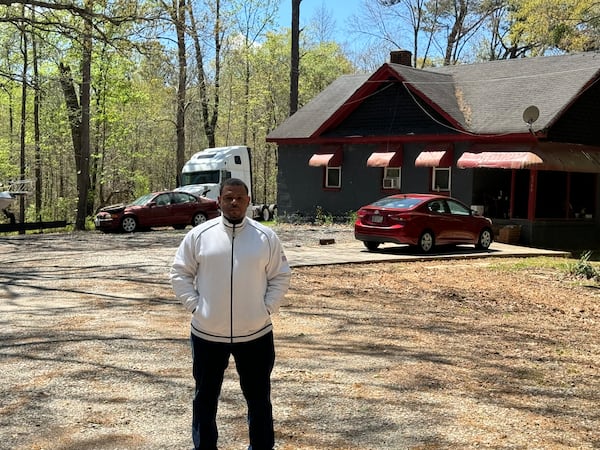 Steven Mack stands on the property he grew up on in South Fulton. His property is adjacent to NextEra Energy Resources land. Credit Adrianne Murchison