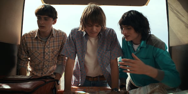 STRANGER THINGS. (L to R) Noah Schnapp as Will Byers, Charlie Heaton as Jonathan Byers and Finn Wolfhard as Mike Wheeler in STRANGER THINGS. Cr. Courtesy of Netflix © 2022