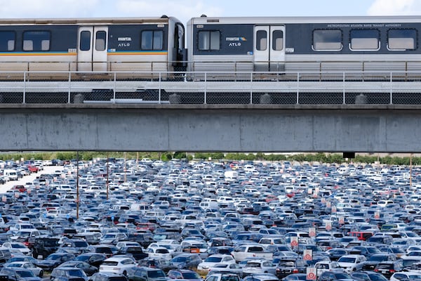 Parked cars are seen from the Hartsfield-Jackson domestic terminal south parking deck in Atlanta on Friday, April 8, 2022.   (Arvin Temkar / arvin.temkar@ajc.com)