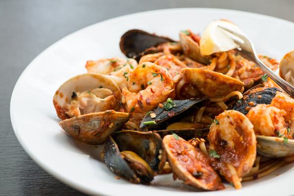 Entrees at Truman include Linguini FraDiavalo with shrimp, mussels, clams, and spicy tomato broth. Photo Credit: Mia Yakel.