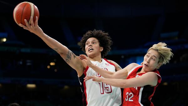 Brittney Griner shoots over a Japanese player during the Paris Olympics.