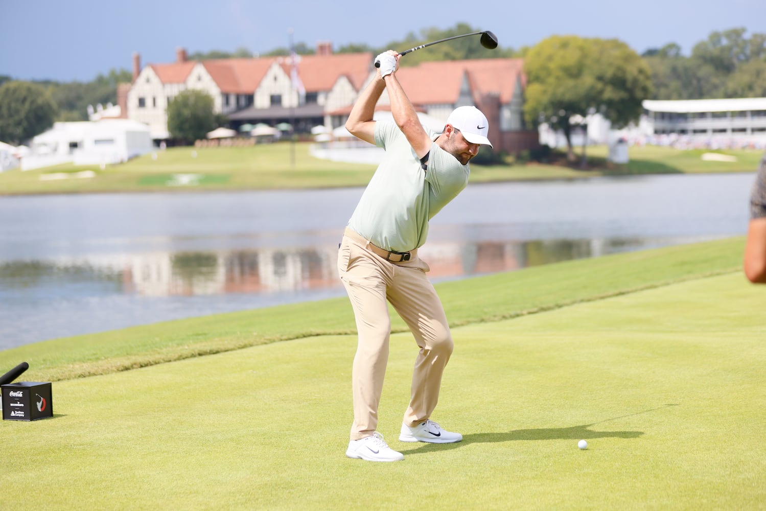 Scottie Scheffler tees off on the eighth hole during the final round of the Tour Championship at East Lake Golf Club, Sunday, Sept. 1, 2024, in Atlanta.
(Miguel Martinez / AJC)