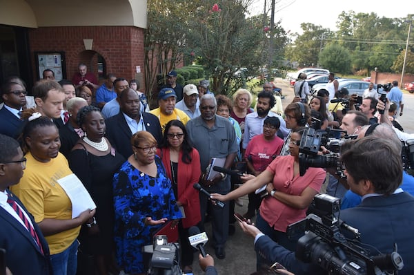 August 24, 2018 Cuthbert - Voting rights advocates including Helen Butler with Georgia Coalition for the People’s Agenda speak outside Randolph County Government Center after Randolph County Board of Elections defeated a contentious proposal to close seven rural voting locations on Friday, August 24, 2018. HYOSUB SHIN / HSHIN@AJC.COM