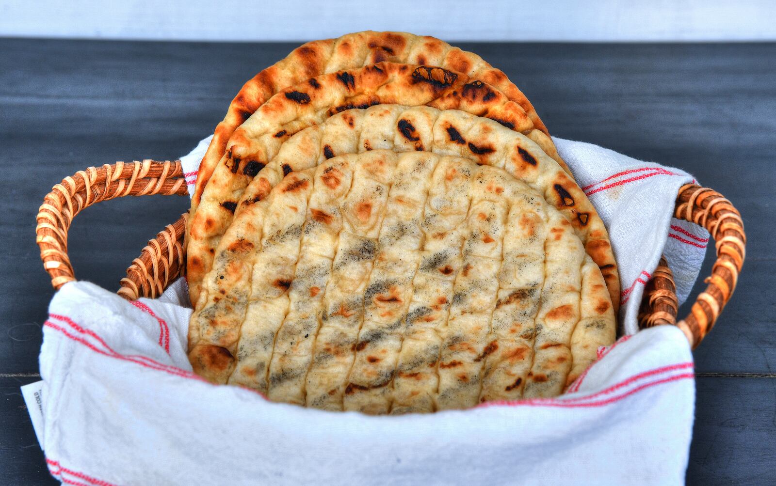 This Homemade Pita Bread is based on a recipe in “Modern Greek Cooking: 100 Recipes for Meze, Entrees, and Desserts” (Rizzoli, $37.50) by Atlanta chef Pano Karatassos. (Styling by Lisa Hanson / Chris Hunt for the AJC)