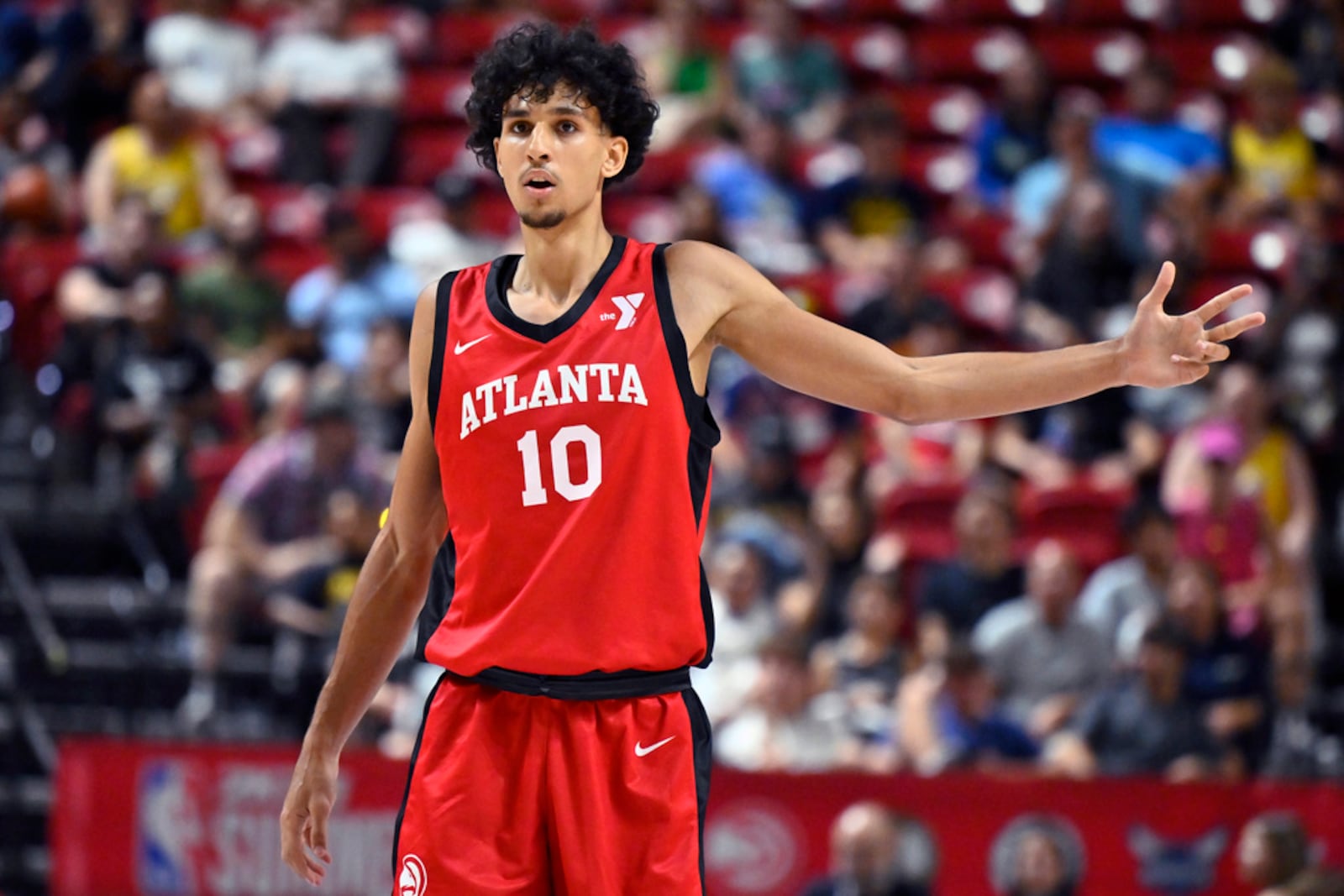 Atlanta Hawks forward Zaccharie Risacher (10) gestures after a basket against the Washington Wizards during the second half of an NBA summer league basketball game Friday, July 12, 2024, in Las Vegas. (AP Photo/David Becker)