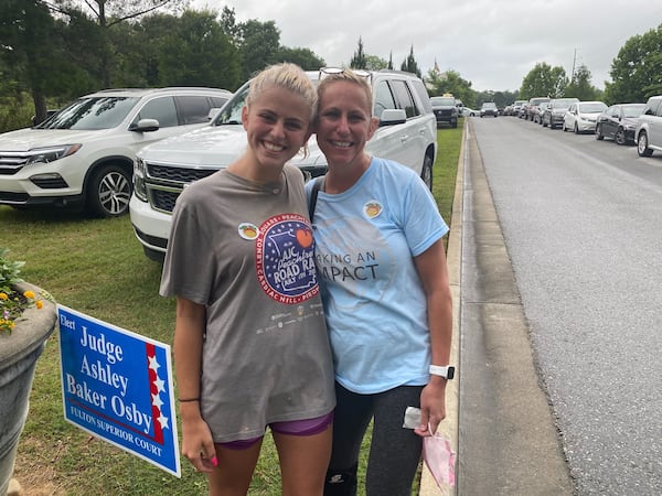 Mother and daughter, Carleigh Hyser and Kristin Gotham after voting at the Johns Creek Environmental Campus. (ADRIANNE MURCHISON/AJC)