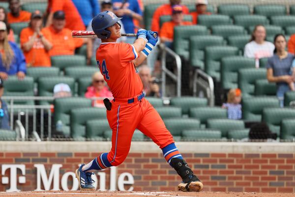 Parkview’s Colin Houck hits a sacrifice fly scoring a run during the first inning against Lowndes in game two of the GHSA baseball 7A state championship at Truist Park, Wednesday, May 17, 2023, in Atlanta. (Jason Getz / Jason.Getz@ajc.com)