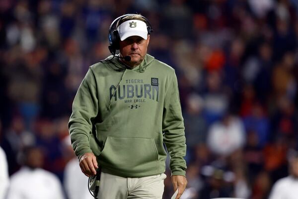 Auburn head coach Hugh Freeze walks off the field during the second half of an NCAA college football game against Texas A&M, Saturday, Nov. 23, 2024, in Auburn, Ala. (AP Photo/Butch Dill)