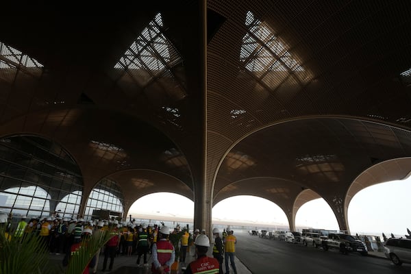 Cambodian visit an under construction of a new airport of Techo International Airport at the outskirts of Phnom Penh Cambodia, Friday, March 21, 2025. (AP Photo/Heng Sinith)