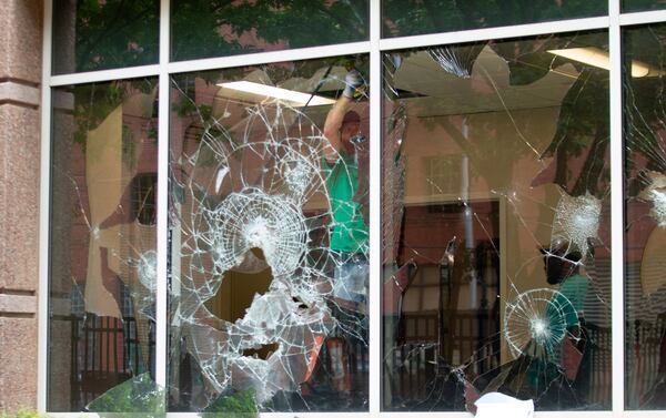 The federal building had a broken glass door, several broken windows and burn marks on interior walls.