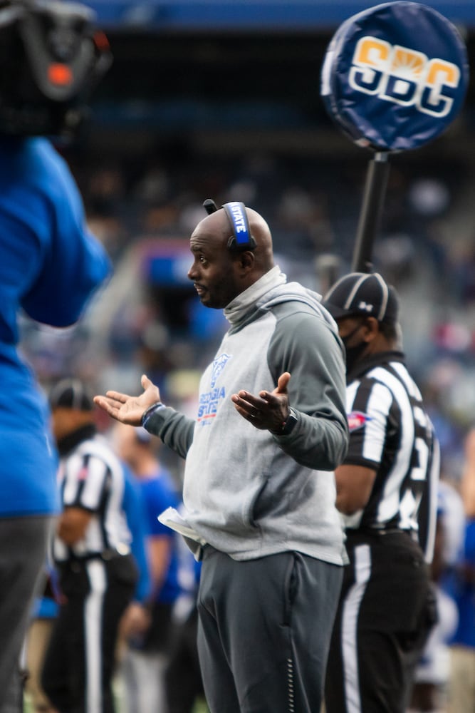 Assistant coach Cory Peoples directs players from the sideline. CHRISTINA MATACOTTA FOR THE ATLANTA JOURNAL-CONSTITUTION