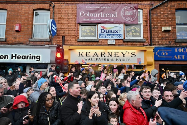 People line the streets as President Joe Biden tours in Dundalk, Ireland, April 12, 2023. (Kenny Holston/The New York Times)