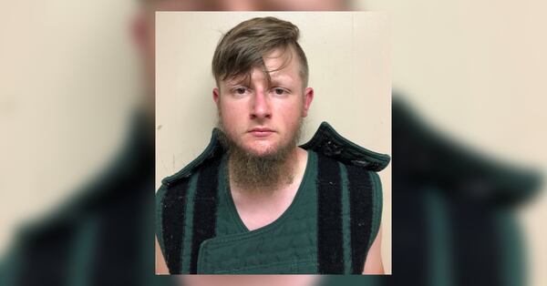 Robert Aaron Long, 21, of Woodstock, was arrested in Crip County and charged with murder in the case of three separate shootings that left eight people dead.