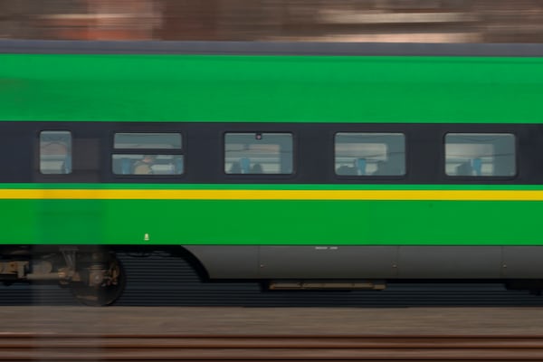 A train makes it's way as people head back home ahead of the Lunar New Year in Beijing on Friday, Jan. 24, 2025. (AP Photo/Aaron Favila)