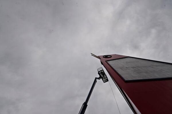 The Big Chicken was being repainted Wednesday, March 22, 2017. Marietta's roadside icon at 12 Cobb Parkway is being renovated.